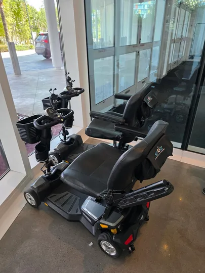 Two Orlando mobility scooter rentals on display and available for vacation use.